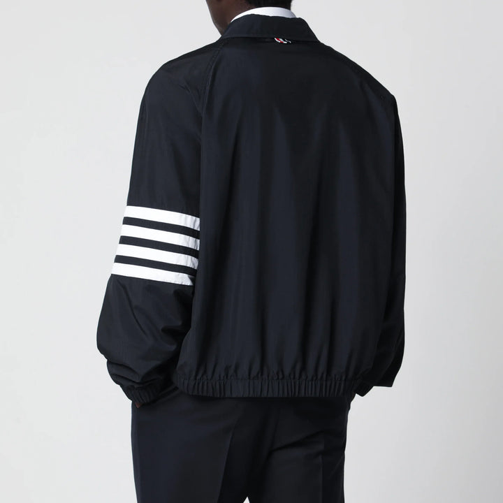 Thom Browne - Lightweight navy blue zip-up jacket Brand Apparel &amp; Accessories > Clothing > Outerwear > Coats &amp; Jackets
